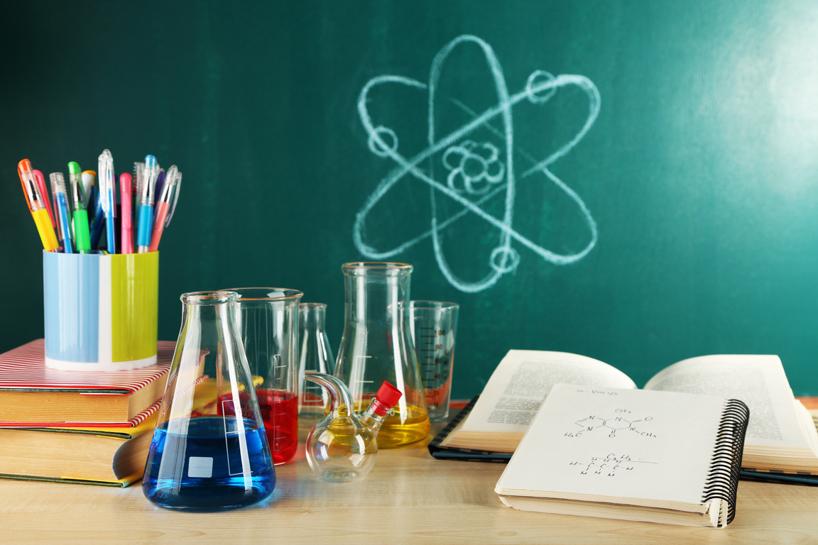 Desk in Chemistry Class with Beakers